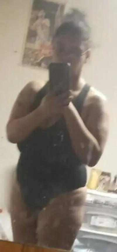 Mixed Redbone showing off her thong bodysuit cover image
