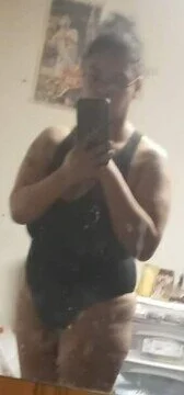 Mixed Redbone showing off her thong bodysuit main image