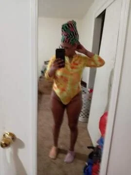 Mixed Redbone showing off her thong bodysuit image 6