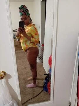 Mixed Redbone showing off her thong bodysuit image 8