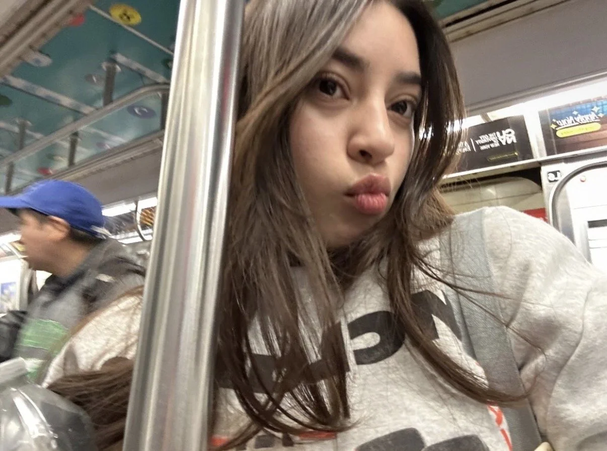 pretty face latina showing off titties image 3