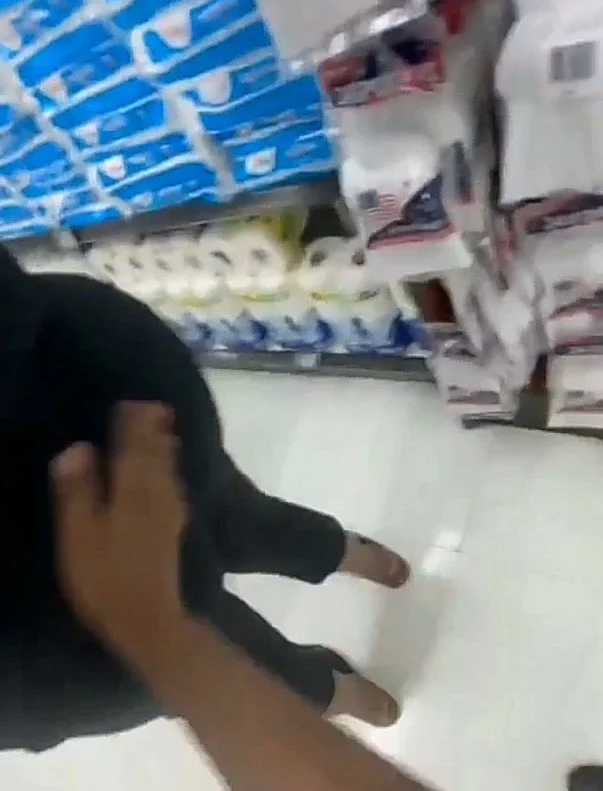 Helping a stranger swipe the spider off main image