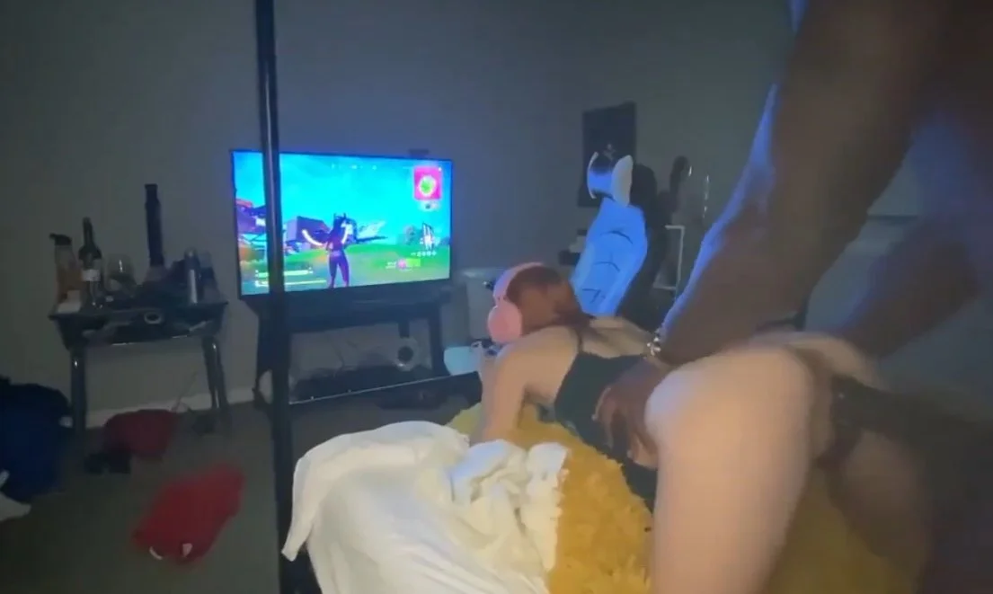 Whore takes doggystyle while gaming image 1