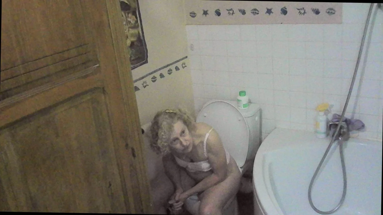 Cheating granny nurse Solange's whole toilet set-caught again with her difficult moments main image