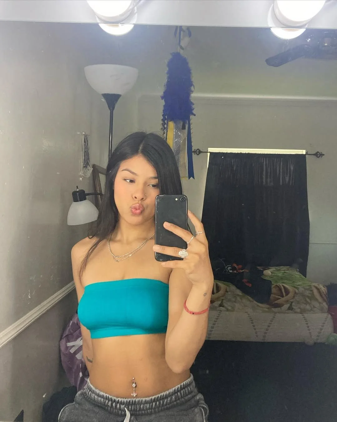 Sexy Latina likes showing her nipples image 2