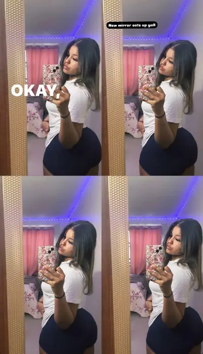 Latina puts her butt in tight navy blue shorts cover image