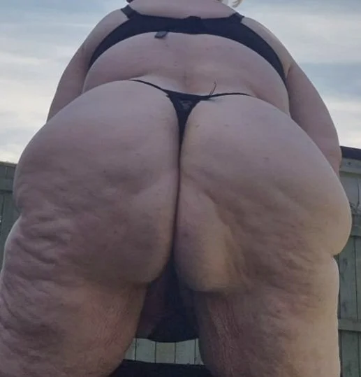 British wife posing in her thong inside and outside image 2