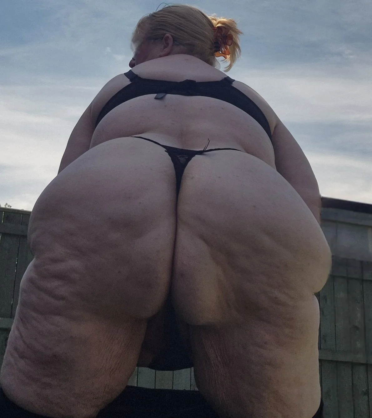 British wife posing in her thong inside and outside image 6