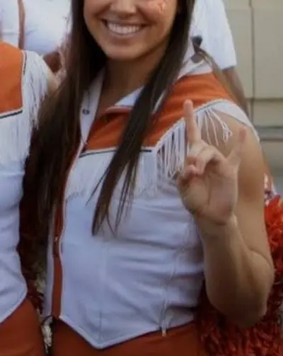 Longhorns cheerleader getting a facial cover image