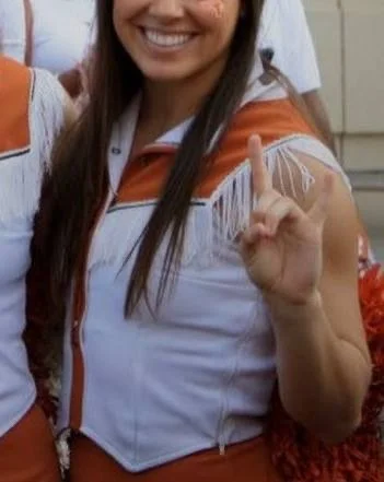 Longhorns cheerleader getting a facial main image