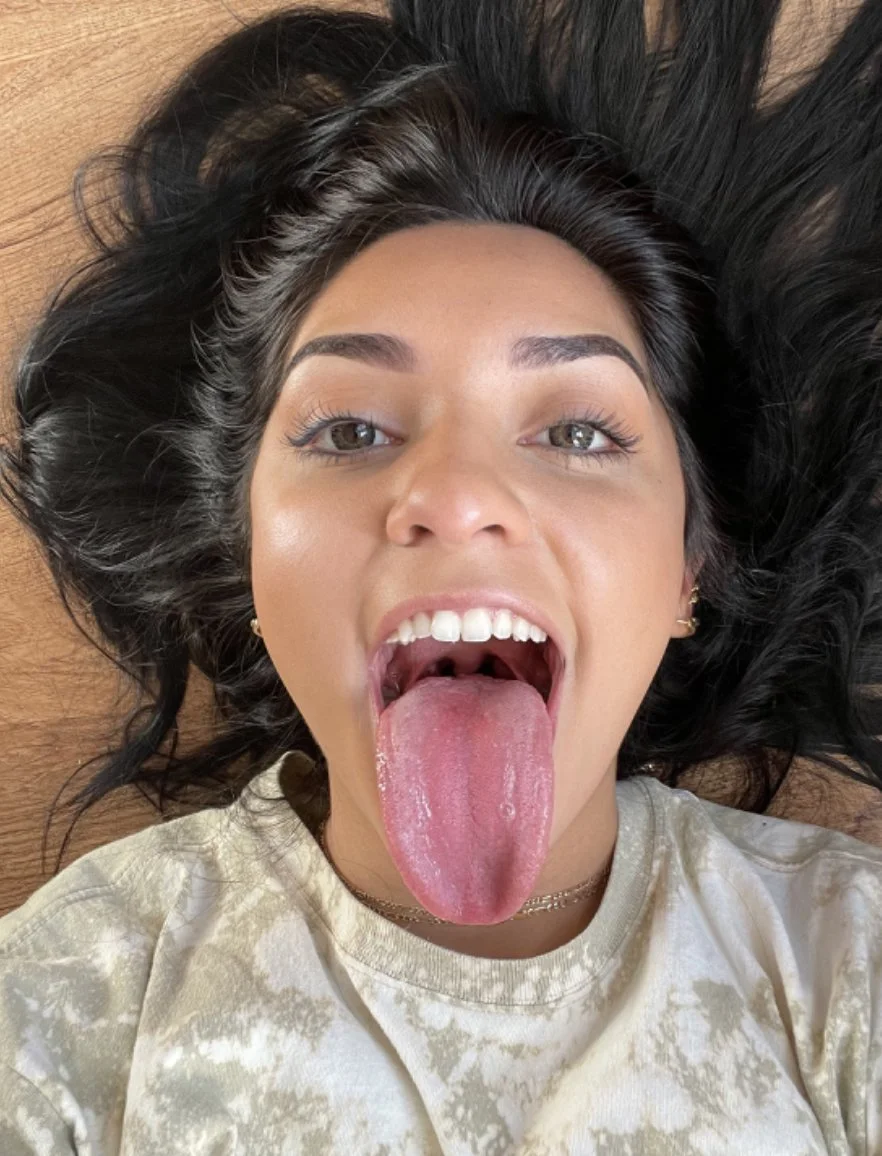 Gorgeous latina with an incredible tongue is begging to get throatfucked image 14