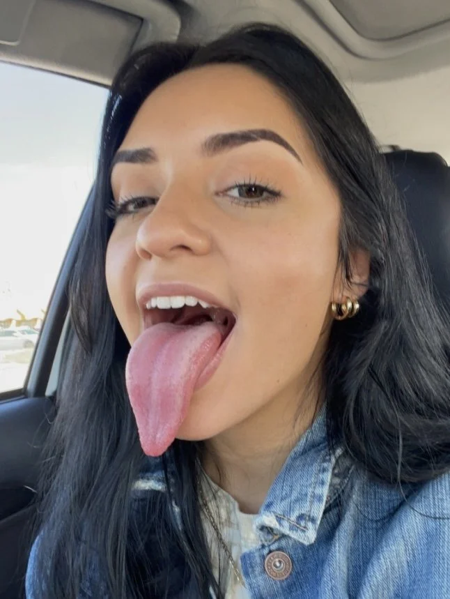 Gorgeous latina with an incredible tongue is begging to get throatfucked image 2