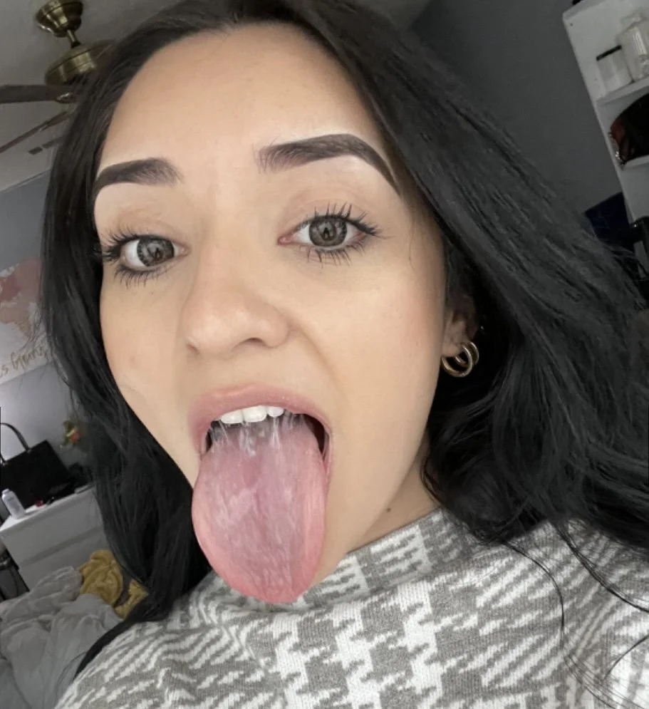 Gorgeous latina with an incredible tongue is begging to get throatfucked image 6