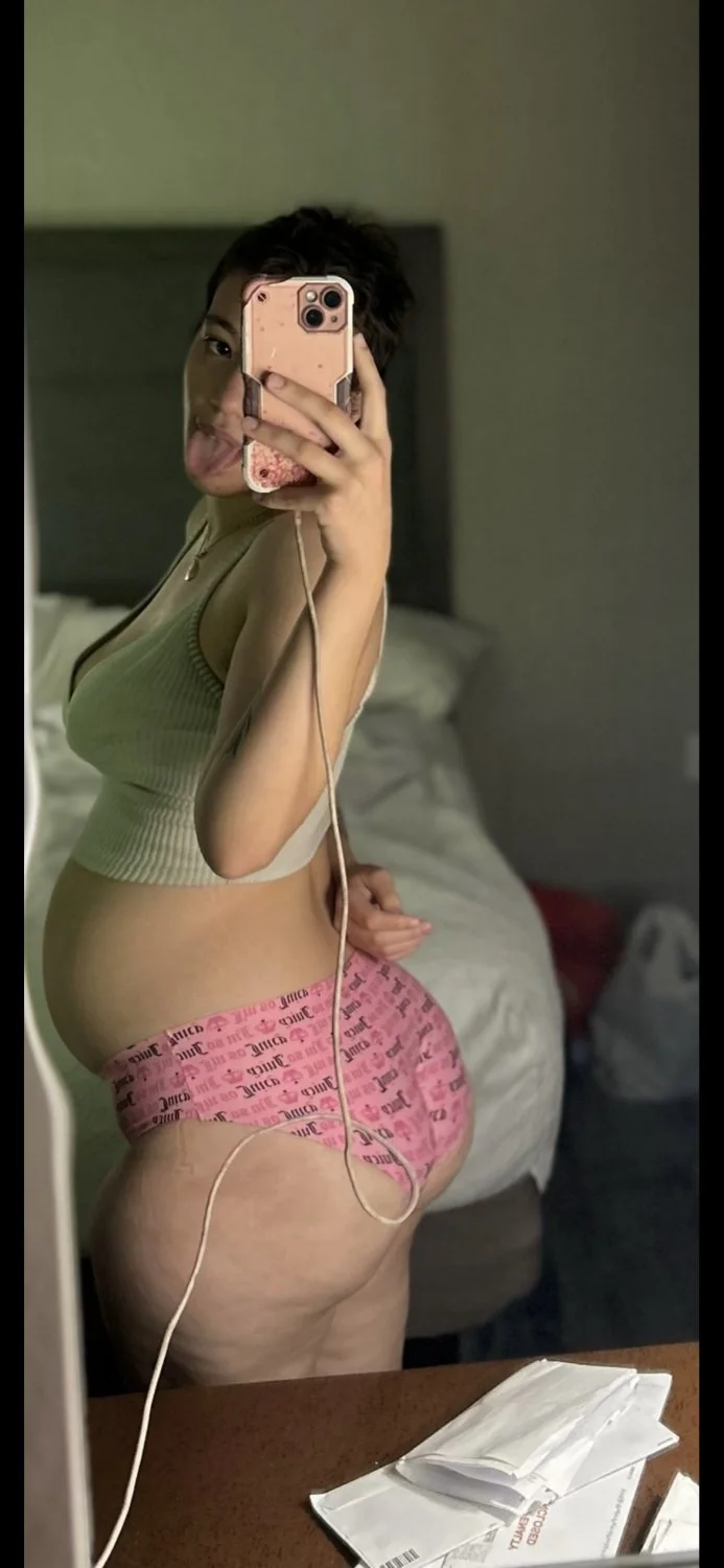 Pregnant Latina slut image 1