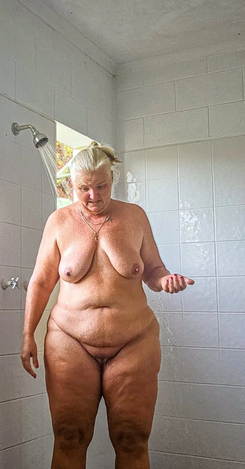 Chubby mature naturist image 25