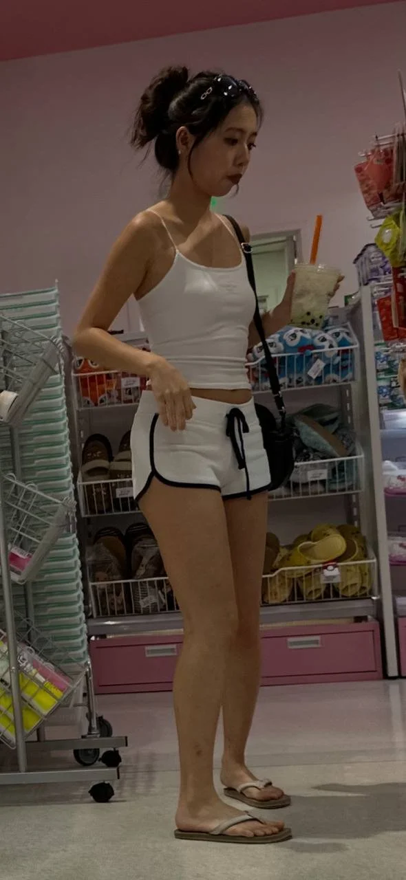 Creeping on hot Asian in shorts image 18