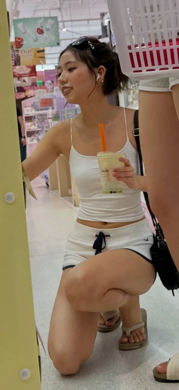 Creeping on hot Asian in shorts image 27