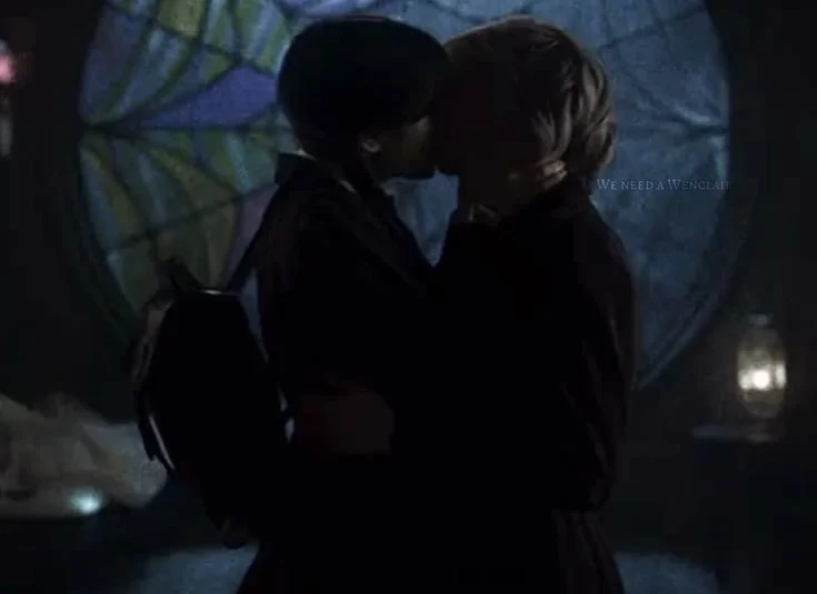 Wednesday Addams and Enid Sinclair kiss image 2