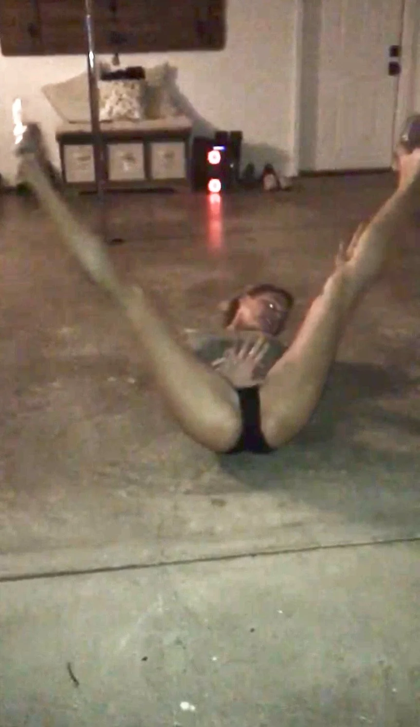 Wife stripping in the garage for friends image 2